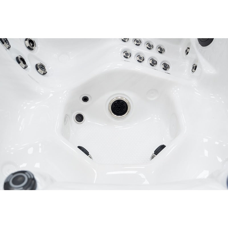 Central interior of the Platinum Spa Refresh Hot tub with floor jet, side jets and structured floor for safe standing
